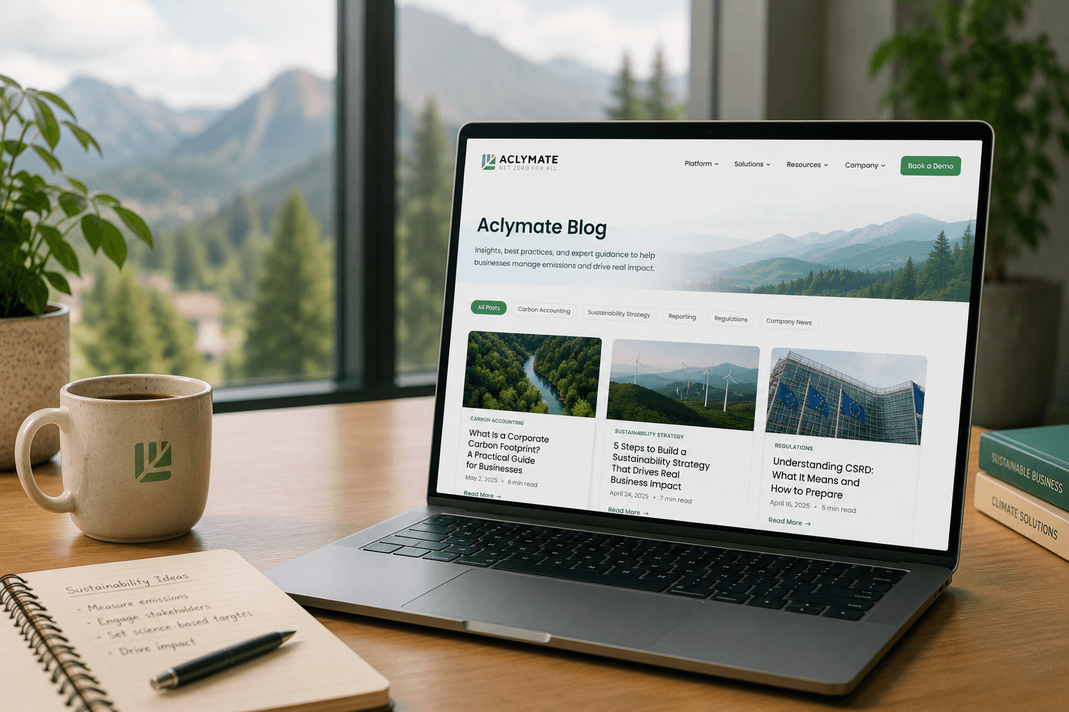 The Aclymate blog open on a laptop